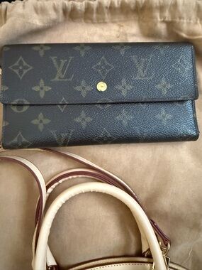 Authentic LOUIS VUITTON Monogram Tri-Fold Porto Tresor International Wallet